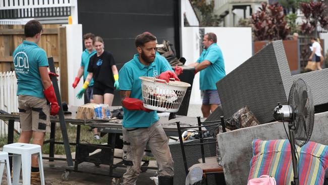 Cleaning up in Vincent St, Auchenflower. Picture: Annette Dew