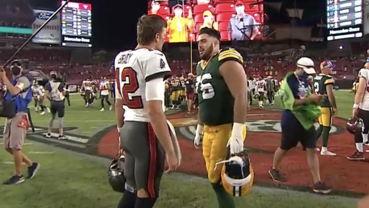 Tom Brady speaks with Jon Runyan Jr.