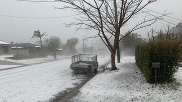 A carpet of ice whited out the nature strip and road outside Kri Pierce’s Toormina home.