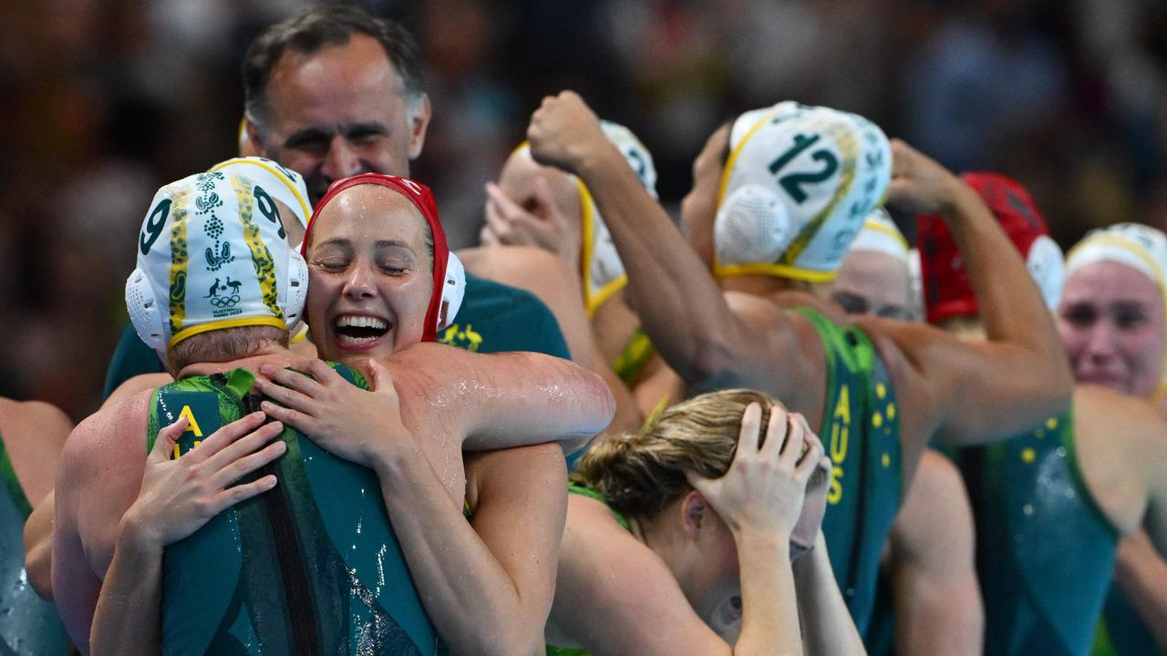 Australia celebrates after beating the USA. Picture: Andreas Solaro / AFP