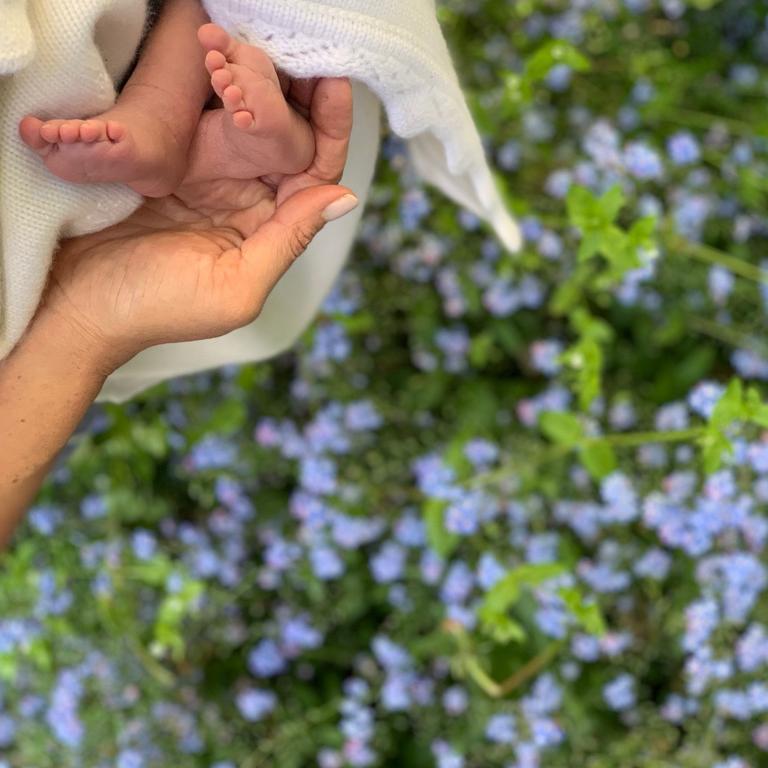 Meghan and the feet of her baby son, Archie Harrison Mountbatten-Windsor. Picture: Sussex Royal / AFP