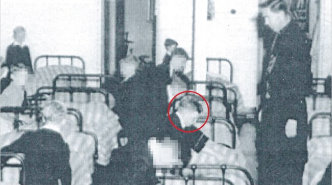 Lawrence as a boy, circled, in his West Australian dormitory, watched by Brother Lawrence Murphy, who raped him.