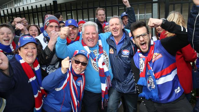 A group of passionate Bulldog supporters at the Whitten Oval in Footscray.