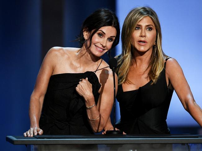 Jennifer Aniston (pictured with BFF Courteney Cox) said these days she’s more focused on “my work, my friends, my animals”. Picture: Getty Images