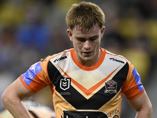 TOWNSVILLE, AUSTRALIA - MAY 24: Lachlan Galvin of the Tigers looks dejected after a Cowboys try during the round 12 NRL match between North Queensland Cowboys and Wests Tigers at Qld Country Bank Stadium, on May 24, 2024, in Townsville, Australia. (Photo by Ian Hitchcock/Getty Images)