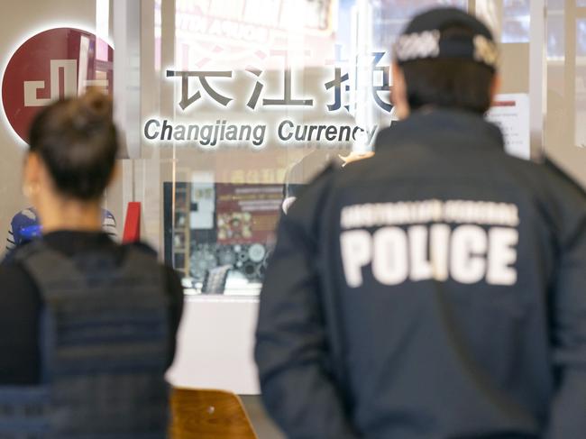 Search warrant at Changjiang Currency Exchange in Sydney CBD conducted as part of Operation Avarus-Nightwolf.