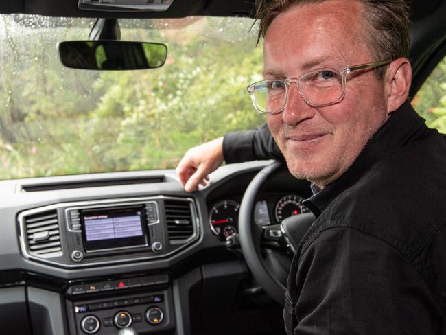 Brendon Drysdale poses for a photo in his new VW Amarok at Terry Hills, Sydney on Monday, 26 October 2020.Growth of online new car sales during COVID-19 and the introduction of new technology such as augmented reality to help buyers feel comfortable making such a big purchase. Picture / Monique Harmer