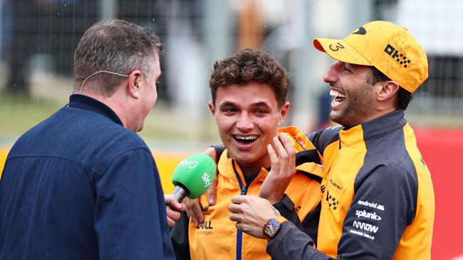 McLaren drivers Lando Norris of Great Britain and Daniel Ricciardo enjoy a laugh ahead of the F1 Grand Prix of Great Britain at Silverstone. Picture: Clive Rose/Getty Images