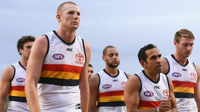 A dejected Crows outfit leaves Traeger Park in Alice Springs after suffering their biggest loss under Don Pyke’s tenure. Picture: Quinn Rooney/Getty Images