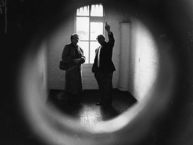 Taken in 1984, this is former Z Ward director of nursing Shirley Kain and ex-administrator Eddie Cunnett in one of the cells — as seen through the door’s peephole.