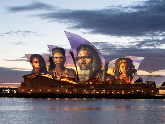 *** BESTPIX *** SYDNEY, AUSTRALIA - JANUARY 26: The sails of the Sydney Opera House are illuminated by a projection of indigenous artwork by Indigenous artist Brett Leavy on January 26, 2024 in Sydney, Australia. The 2024 First Nations projection was created by Aboriginal digital artist Brett Leavy, who worked in consultation with the Metropolitan Local Aboriginal Land Council on the artwork. Australia Day, formerly known as Foundation Day, is the official national day of Australia and is celebrated annually on January 26 to commemorate the arrival of the First Fleet to Sydney in 1788. Many indigenous Australians refer to the day as 'Invasion Day' and there is a growing movement to change the date to one which can be celebrated by all Australians. (Photo by Wendell Teodoro/Getty Images)