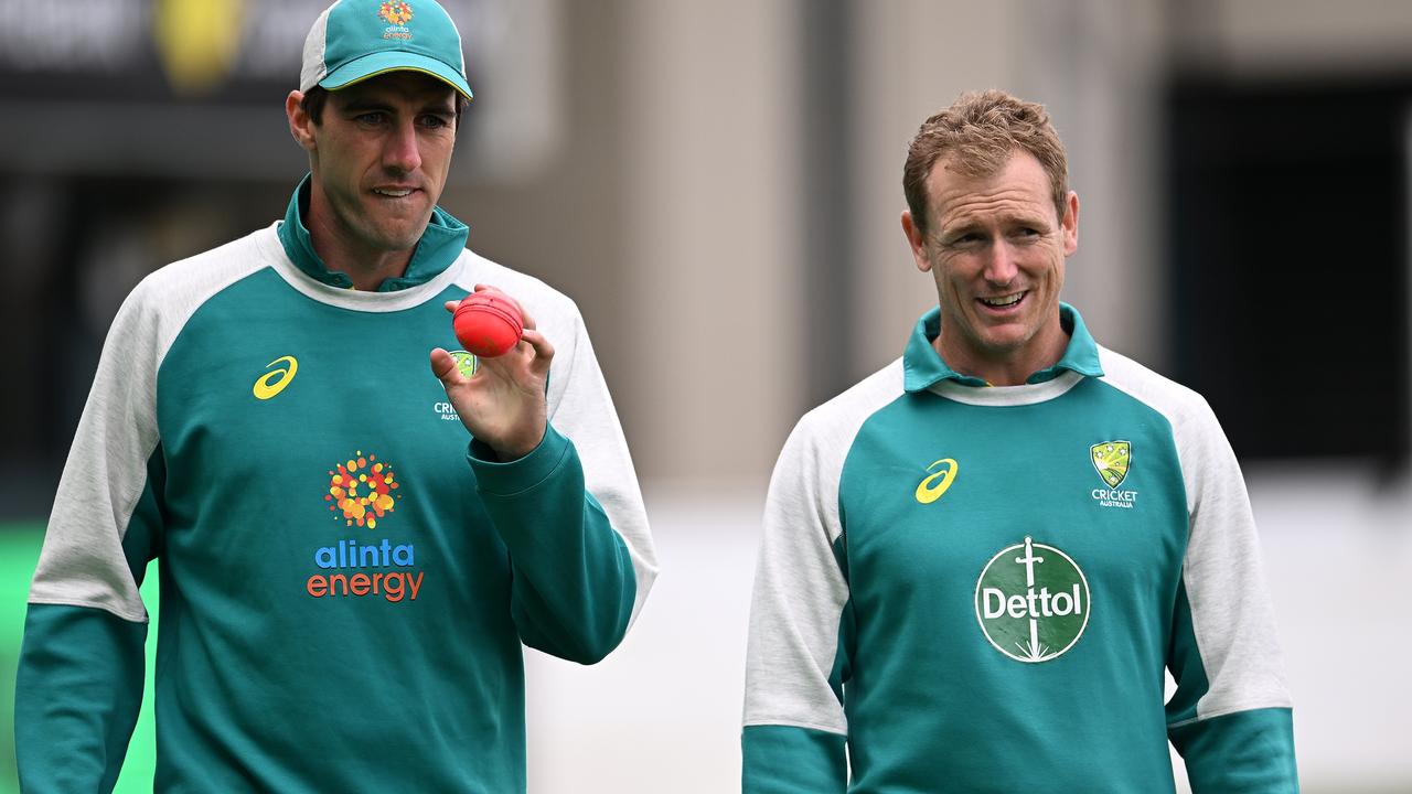 Pat Cummins and George Bailey. Photo by Steve Bell/Getty Images.