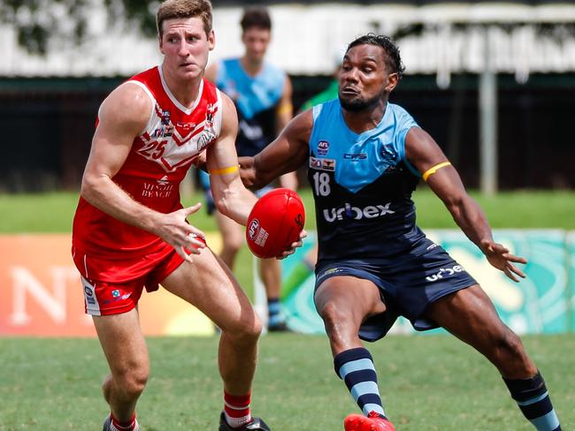 Jack Gleeson of Waratah and Ishmael Palmer of Buffaloes during Round 17 of the 2023-24 NTFL season. Picture: Celina Whan / AFLNT Media