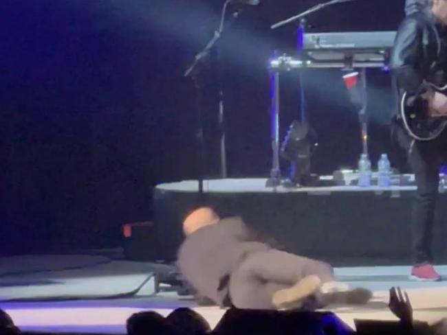 Joel landed on his side before rolling onto his back before being helped up and going on with the show. Picture: Twitter