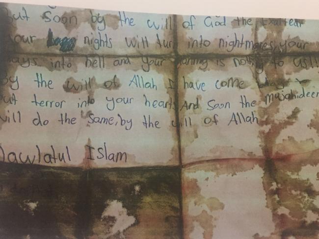 The bloody suicide note found on Farhad Jabar after he was killed in a shootout with police. The note was tendered to the court yesterday.