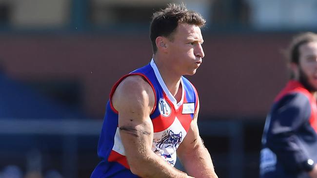 Brent Harvey sprints forward for North Heidelberg in the NFL Division 2 grand final. Picture: Andy Brownbill.