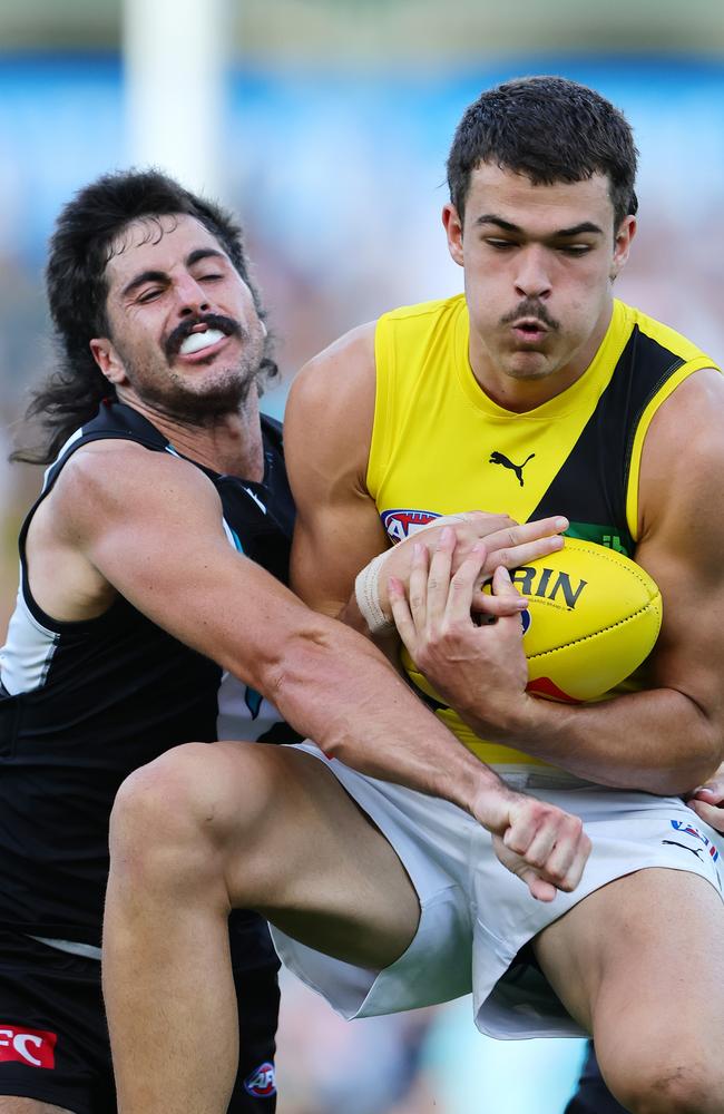 Harry Armstrong takes a contested mark earlier in the season. Picture: Sarah Reed/AFL Photos via Getty Images)