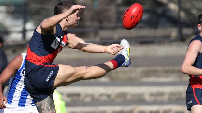 VFL: Sam Lowson gets a kick in his return for Coburg. Picture: Hamish Blair