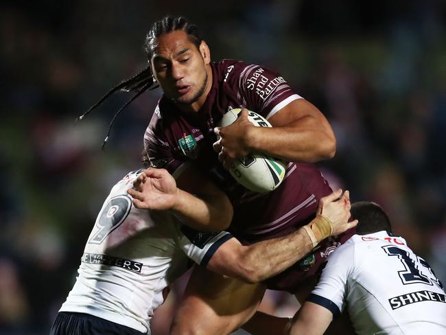 SYDNEY, AUSTRALIA - MAY 31:  Martin Taupau of the Sea Eagles is tackled during the round 13 NRL match between the Manly Sea Eagles and the North Queensland Cowboys at Lottoland on May 31, 2018 in Sydney, Australia.  (Photo by Matt King/Getty Images)