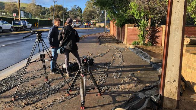 Damage to the footpath caused by the burst main. Picture: Keryn Stevens