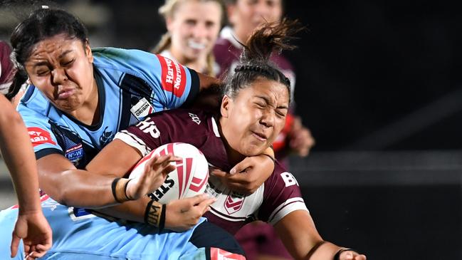 Filomina Hanisi of the Blues makes a tackle during the Women's State of Origin match, 2020. (Photo by Dan Peled/Getty Images)