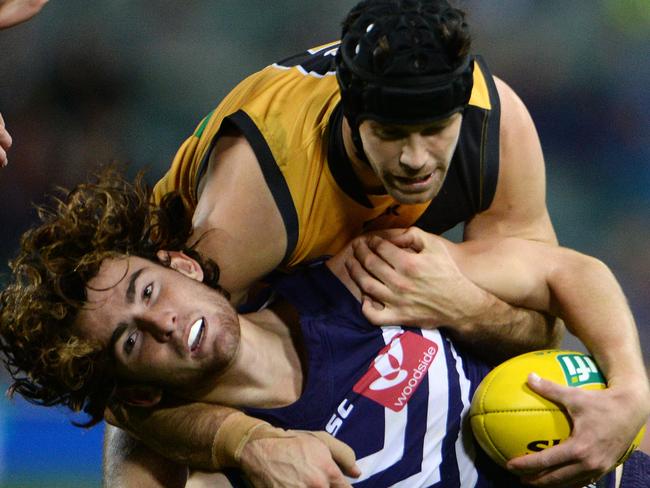 A fractured cheekbone couldn’t stop Trent Cotchin. Picture: Daniel Wilkins