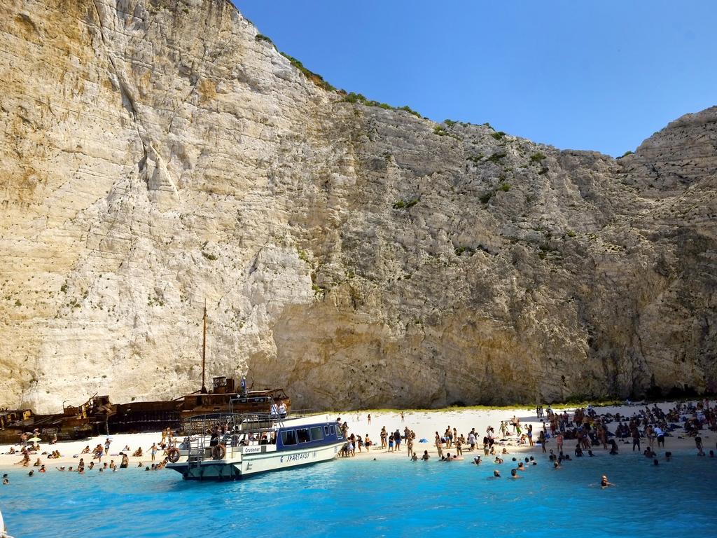 The beach of Navagio, or Shipwreck Beach, is popular with tourists. Picture: AP/Petros Karadjias, File