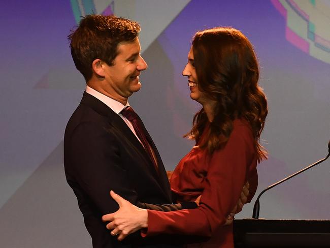 AUCKLAND, NEW ZEALAND - OCTOBER 17: Labour Party leader and New Zealand Prime Minister Jacinda Ardern and Clarke Gayford, fiancÃÂ© of Labor Party Leader and New Zealand Prime Minister Jacinda Ardern,  look on after Ardern claimed victory during the Labor Party Election Night Function at Auckland Town Hall on October 17, 2020 in Auckland, New Zealand. Labour leader Jacinda Ardern has claimed victory in the 2020 New Zealand General Election to secure a second term as prime minister in the 53rd Parliament of New Zealand after defeating National's Judith Collins. The 2020 New Zealand General Election was originally due to be held on Saturday 19 September but was delayed due to the re-emergence of COVID-19 in the community. (Photo by Hannah Peters/Getty Images)