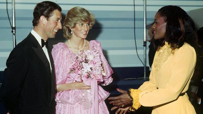 Prince Charles and Princess Diana meet Australian singer Marcia Hines after the 1983 Melbourne Concert Hall show.