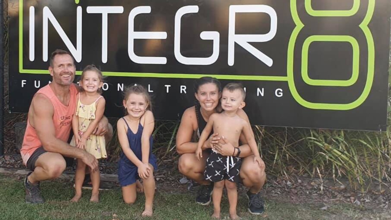 Rowan Baxter, Hannah Clarke and their three children outside the family gym. Picture: Facebook