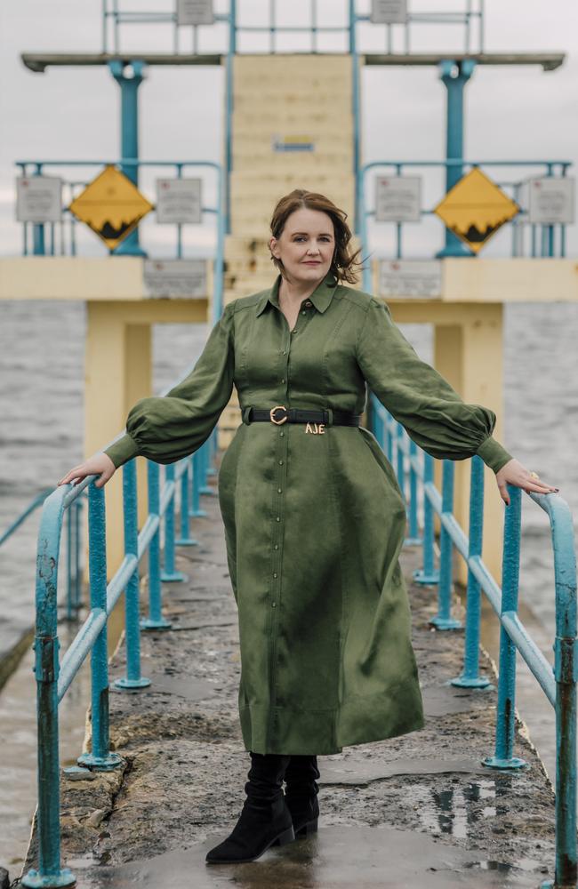 Bringing back a favourite ... Australian bestseller Dervla McTiernan at Blackrock Pier in her native Ireland. The pier features in her new novel The Unquiet Grave, which sees the return of fan fave detective Cormac Reilly. Photo: Nathalie Marquez