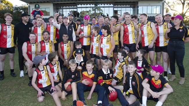 Chris Buss-Charlie Stevens Memorial Trophy Football at Goodwood Oval. Grant Stevens and Greg Buss with the winning Goodwood Saints team. 25th May 2024. Picture: Brett Hartwig