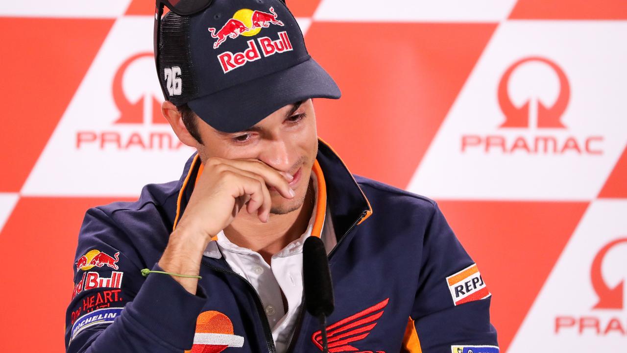 TOPSHOT - Spain's Dani Pedrosa attends a press conference ahead the MotoGP race of the motorcycling Grand Prix at the Sachsenring in Hohenstein-Ernstthal on July 12, 2018. Spain's Dani Pedrosa, three-times a world MotoGP championship runner-up, announced he will retire at the end of the season. The 32-year-old Honda pilot, who won the 125cc category in 2003 and 250cc in 2004 and 2005, currently sits in 12th spot of the MotoGP standings ahead of this weekend's German race in Sachsenring.  / AFP PHOTO / dpa / Jan Woitas / Germany OUT