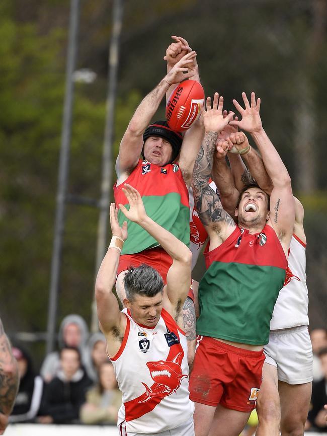 Players contest the ball during the MPNFL Division 1 grand final between Pines and Sorrento. Picture: Andy Brownbill.