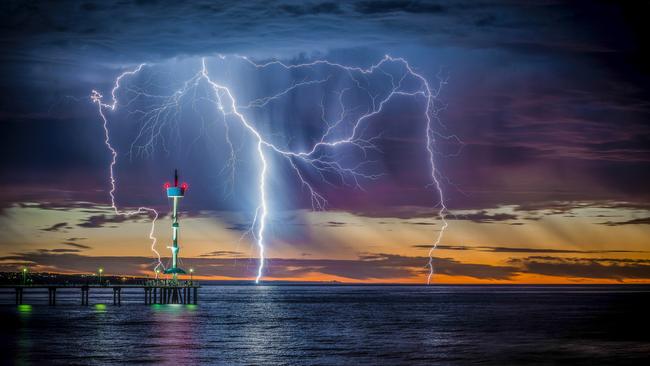 Best Weather Picture 2024 winning photo of lightning over Brighton Jetty. Picture: Andrew Burston