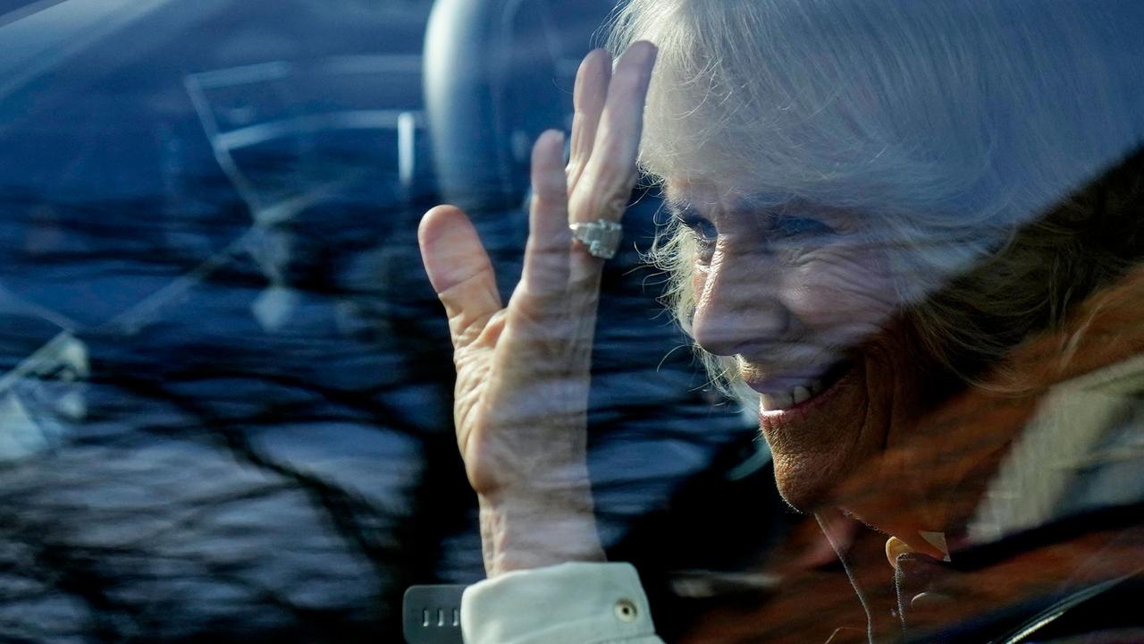 Camilla, Duchess of Cornwall smiles from behind the window of the car as she leaves after visiting the Thames Valley Partnership charity. Picture: Matt Dunham / AFP