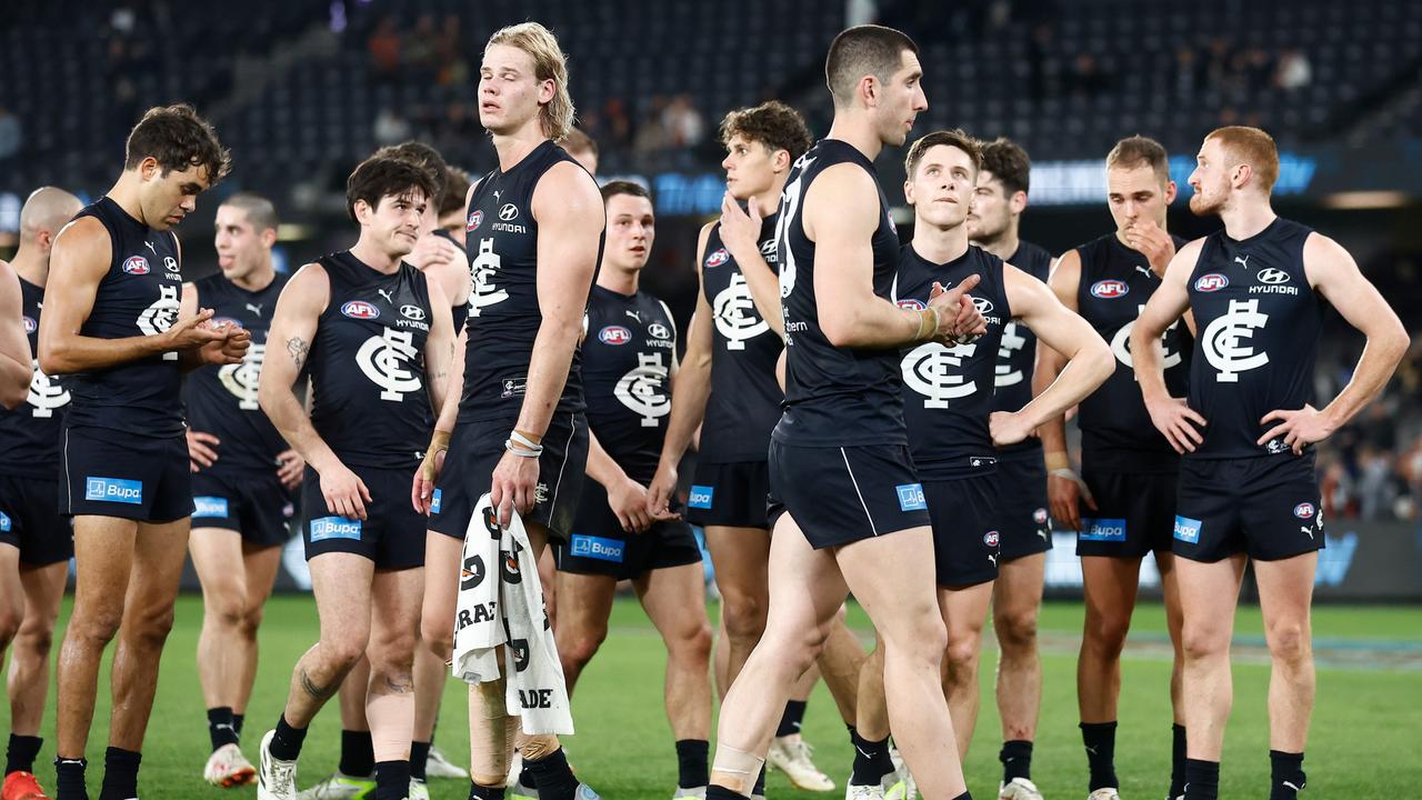 Melbourne, Australia. 02nd June, 2023. Patrick Cripps of Carlton leads  teammates from the field during the AFL Round 12 match between the  Melbourne Demons and the Carlton Blues at the Melbourne Cricket