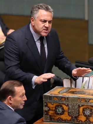 And attack ... Treasurer Joe Hockey defends his Budget during Question Time in the House of Representatives.