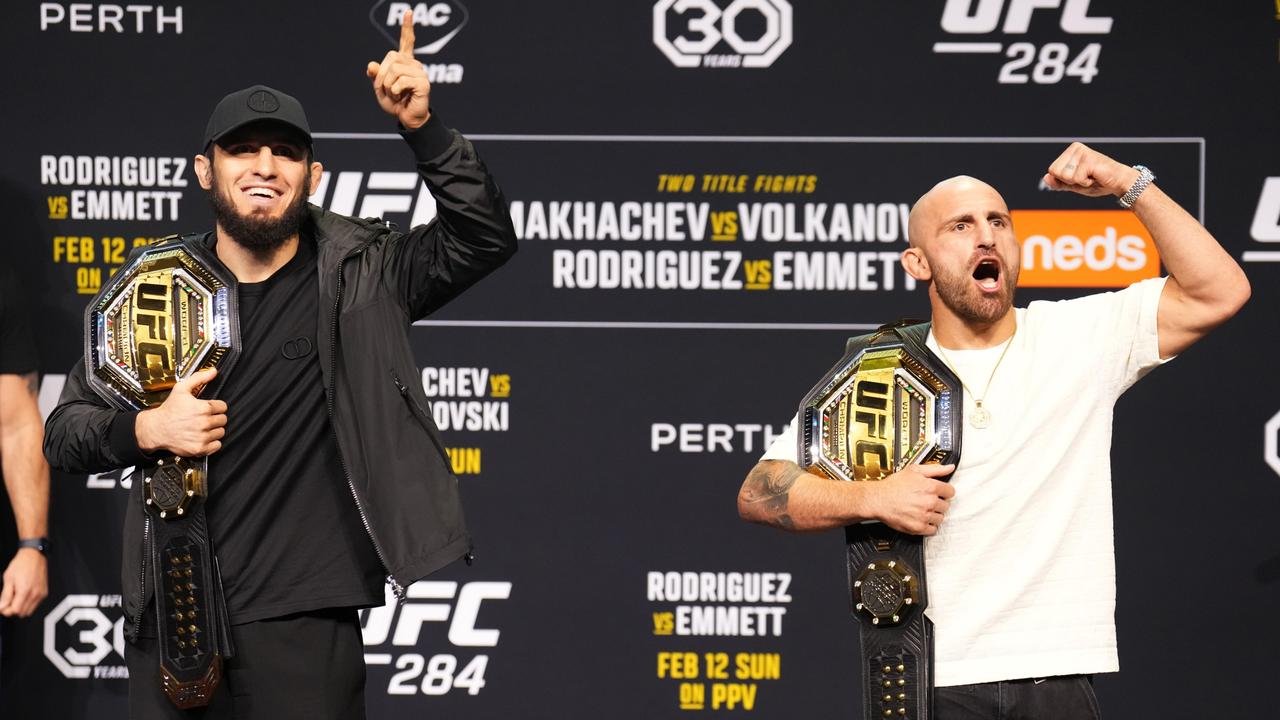 Islam Makhachev and Alexander Volkanovski pose during the UFC 284 press conference on Friday. (Photo by Chris Unger/Zuffa LLC via Getty Images)