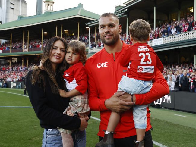 DAILY TELEGRAPH AUGUST 27, 2023. Retired champion Lance Franklin during a lap of honour with his wife Jesinta and their children Rocky and Tullulah at half-time of the Sydney Swans Round 24 match against Melbourne at the SCG. Picture: Jonathan Ng