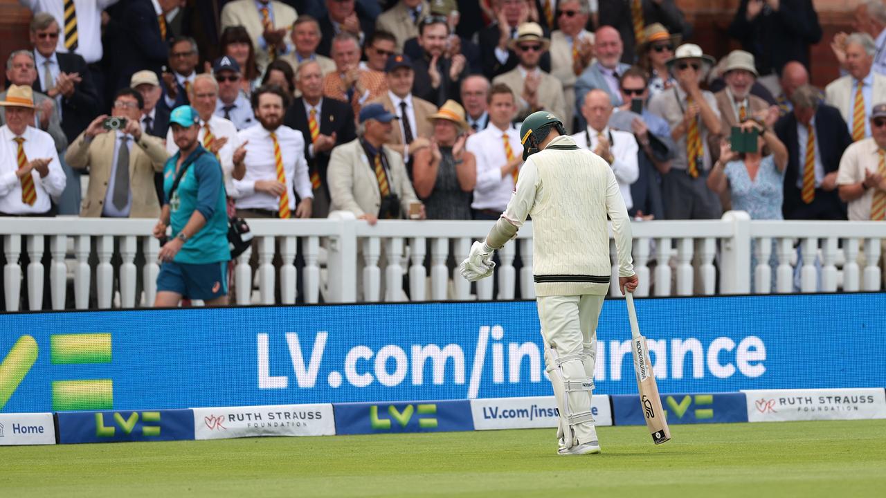 Nathan Lyon walks off to huge applause. (Photo by Ryan Pierse/Getty Images)