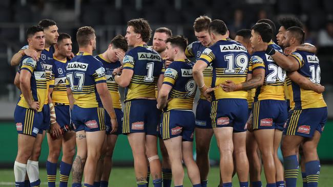 Eels players form a huddle after their loss in the NRL Semi Final between the Parramatta Eels and South Sydney Rabbitohs at Bankwest Stadium, Parramatta. Picture: Brett Costello