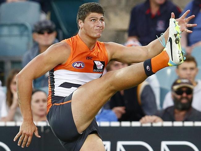 AFL Round 4. GWS Giants vs Western Bulldogs at Startrack Oval, Canberra. Jonathan Patton kicks at goal . Pic: Michael Klein. Saturday April 12, 2014.