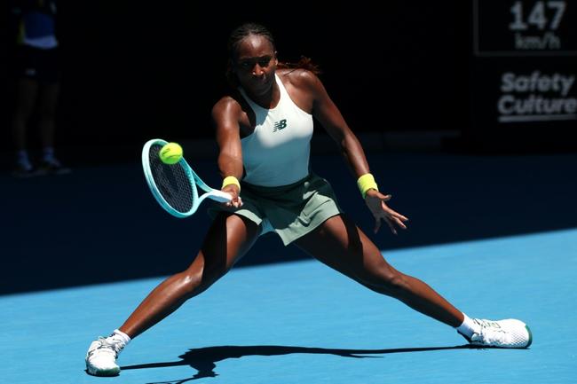 Coco Gauff returns on her way to victory against US compatriot Sofia Kenin