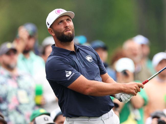 AUGUSTA, GEORGIA - APRIL 09: Jon Rahm of Spain plays his shot from the 12th tee during a practice round prior to the 2024 Masters Tournament at Augusta National Golf Club on April 09, 2024 in Augusta, Georgia.   Andrew Redington/Getty Images/AFP (Photo by Andrew Redington / GETTY IMAGES NORTH AMERICA / Getty Images via AFP)