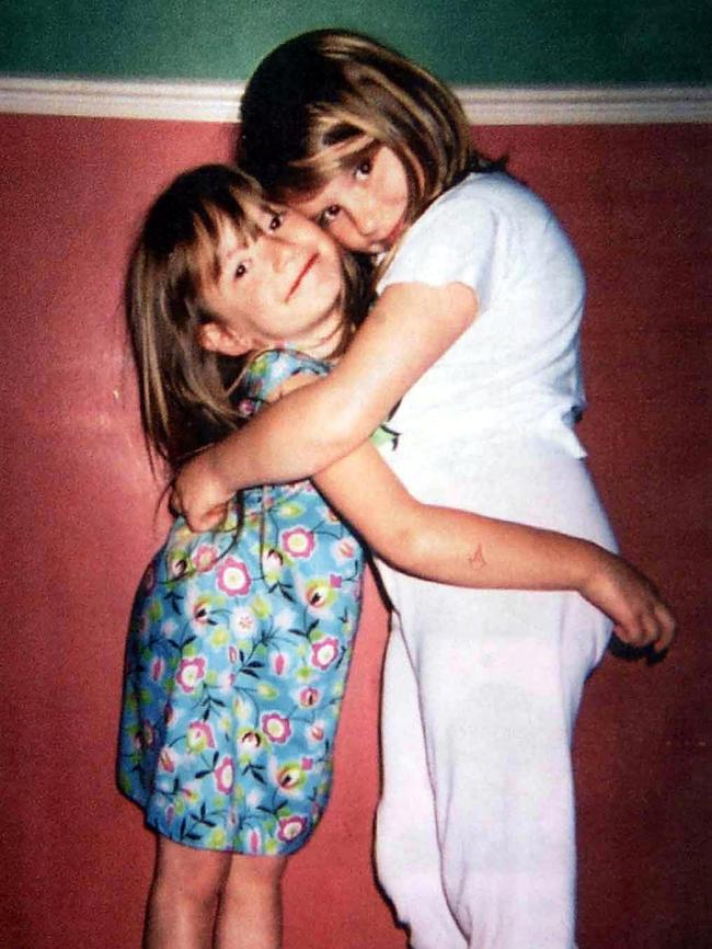 Sarah Payne hugging her young sister Charlotte before she was abducted and murdered in West Sussex, England, in 2000. Picture: Supplied