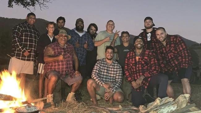 Latrell Mitchell and Josh Addo-Carr (fourth and third from right) in the now infamous photo of a camping trip to Mitchell’s farm in Taree.