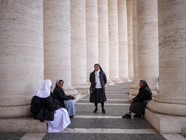 Nuns relax in the colonnade of St Peter's Square on March 16, 2025 in Vatican City, Vatican. The Pope thanked wellwishers today for their prayers in a message from hospital. Picture: Christopher Furlong/Getty Images