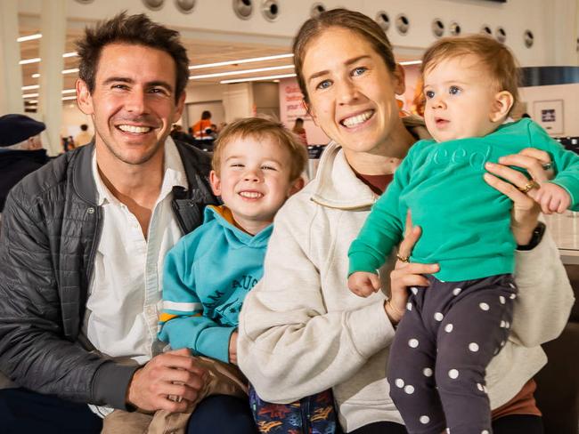 Jessica and Dylan Stenson with kids Billy, 4, Ellie, 9, months, at Adelaide Airport heading to Paris via Gold coast for a half marathon, pictured on July 7th, 2024.Picture: Tom Huntley
