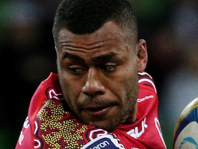 Super Rugby - Melbourne Rebels v Queensland Reds at AAMI Park, Reds Samu Kerevi breaks a Bryce Hegarty tackle. June 27th 2014. Picture : Colleen Petch